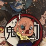 Spinning Metal Inosuke Keychain – Demon Slayer Anime Collectible